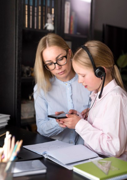 Tutor reading with a child in a calm, encouraging setting
